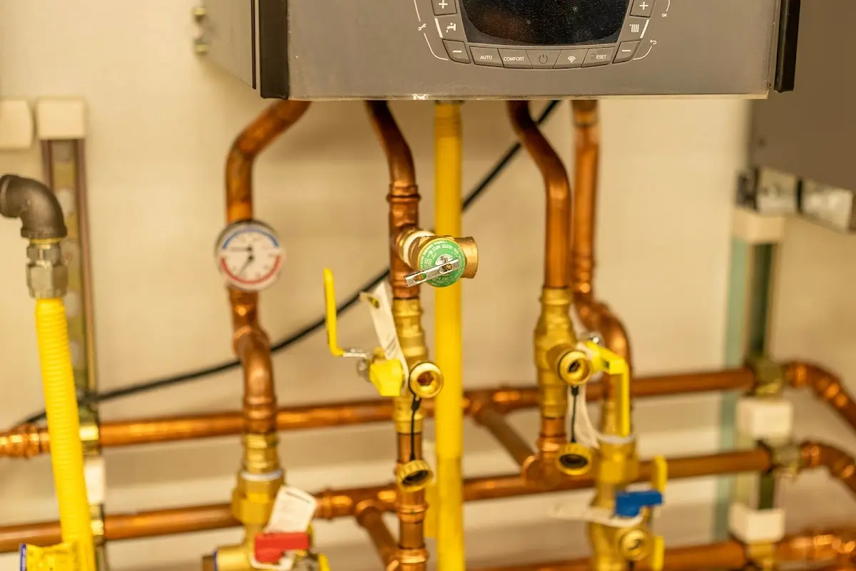 Licensed technician providing Backflow Prevention for a homeowner in Norton